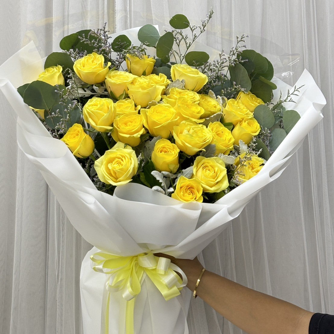 "Citrus Bliss" Bouquet Of 25 Yellow Roses with Caspia and Eucalyptus leaves